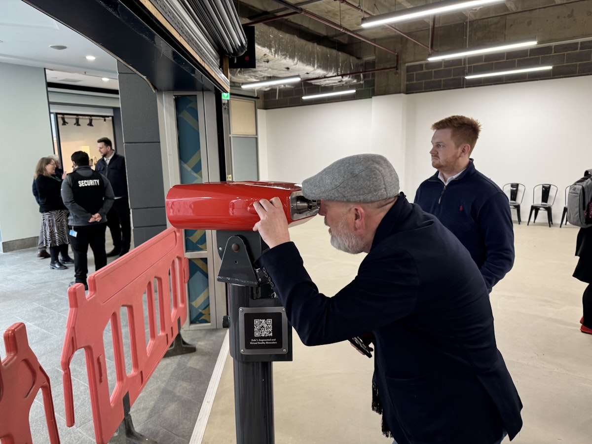 The immaculately-dressed Mark Hubert of James St Peter's giving the AR binoculars a test